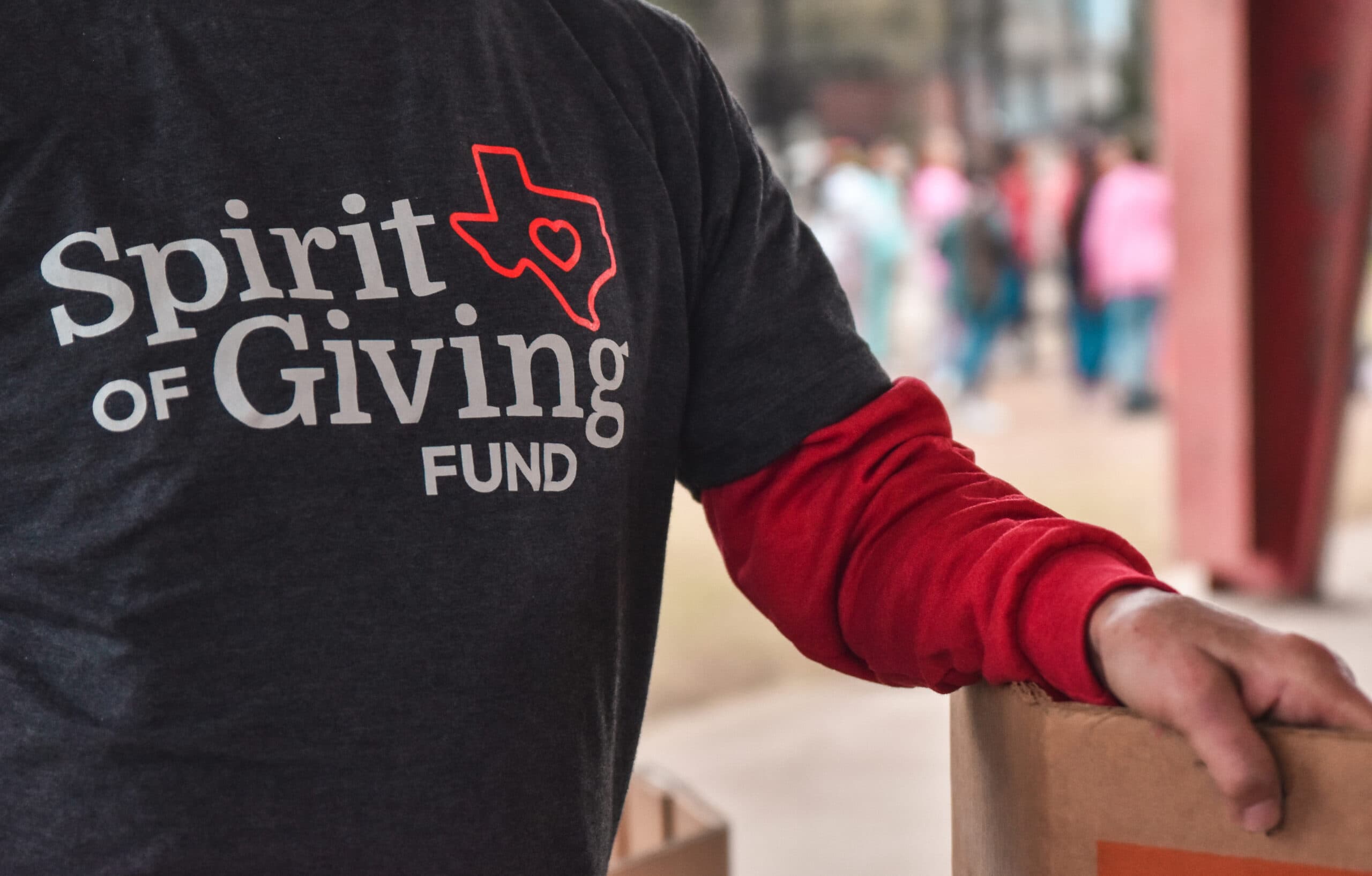 Worker helping pack boxes