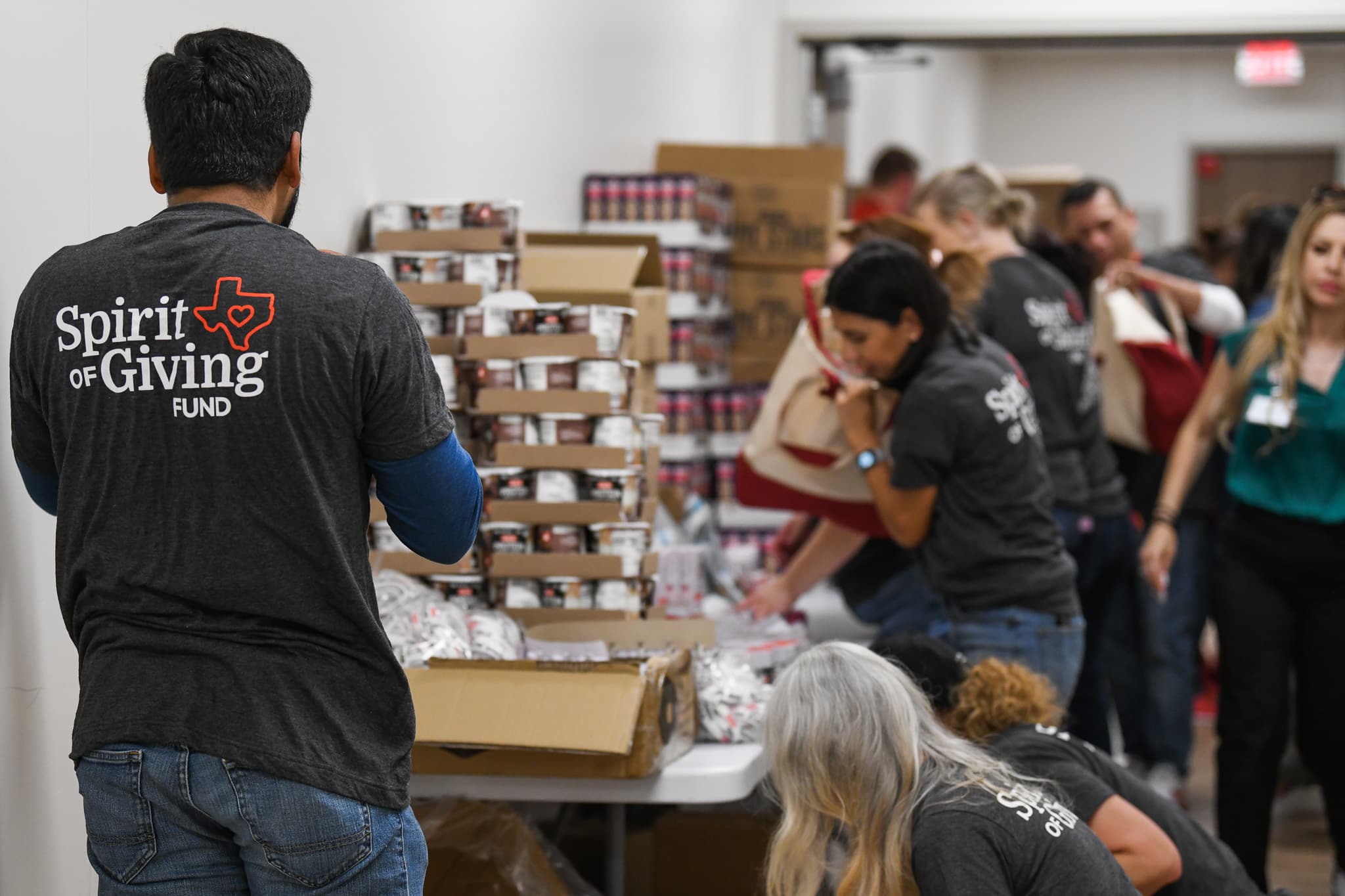 Volunteers assembling care packages for Uvalde